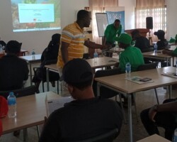 Mr. Daniel Afona - Gender Lead for MiDA delivering a presentation on Gender.
